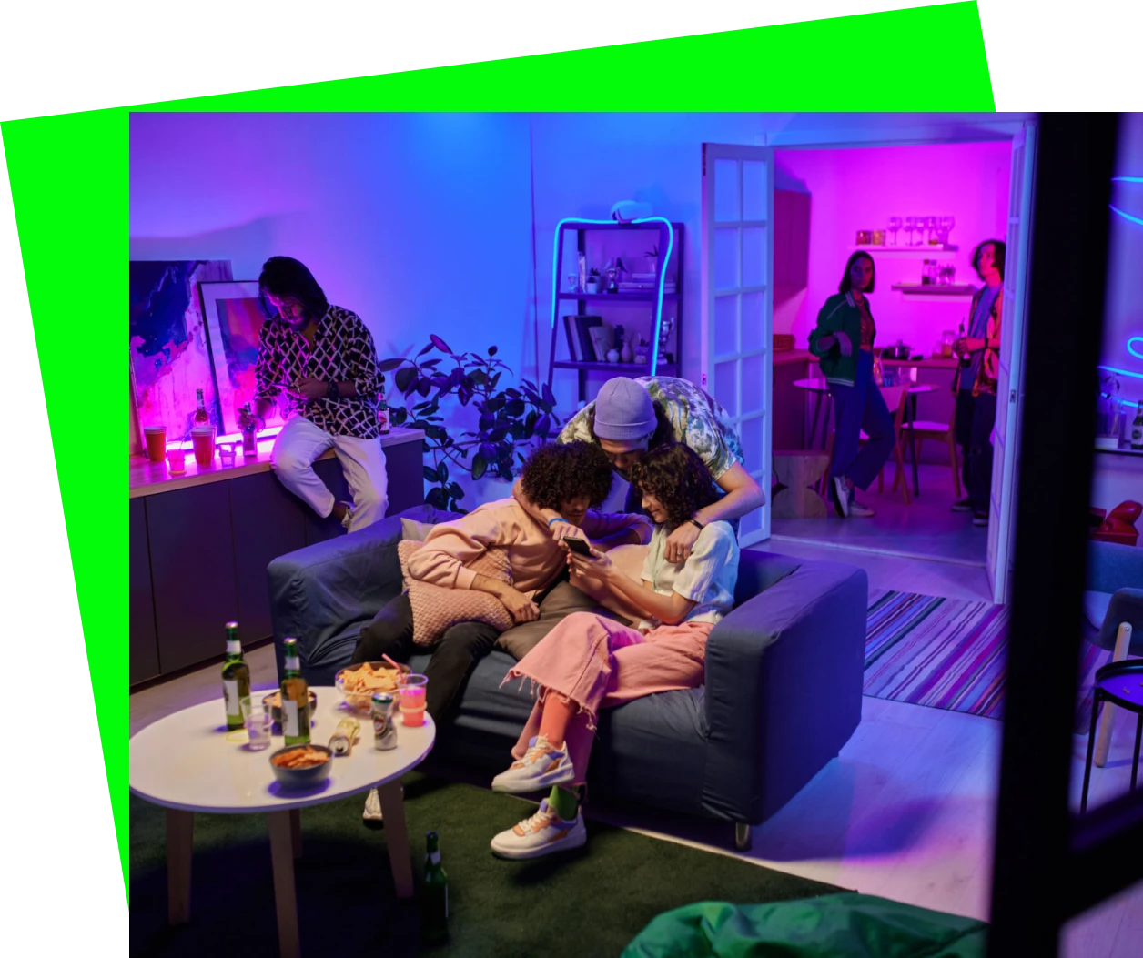 Group relaxing on a couch indoors