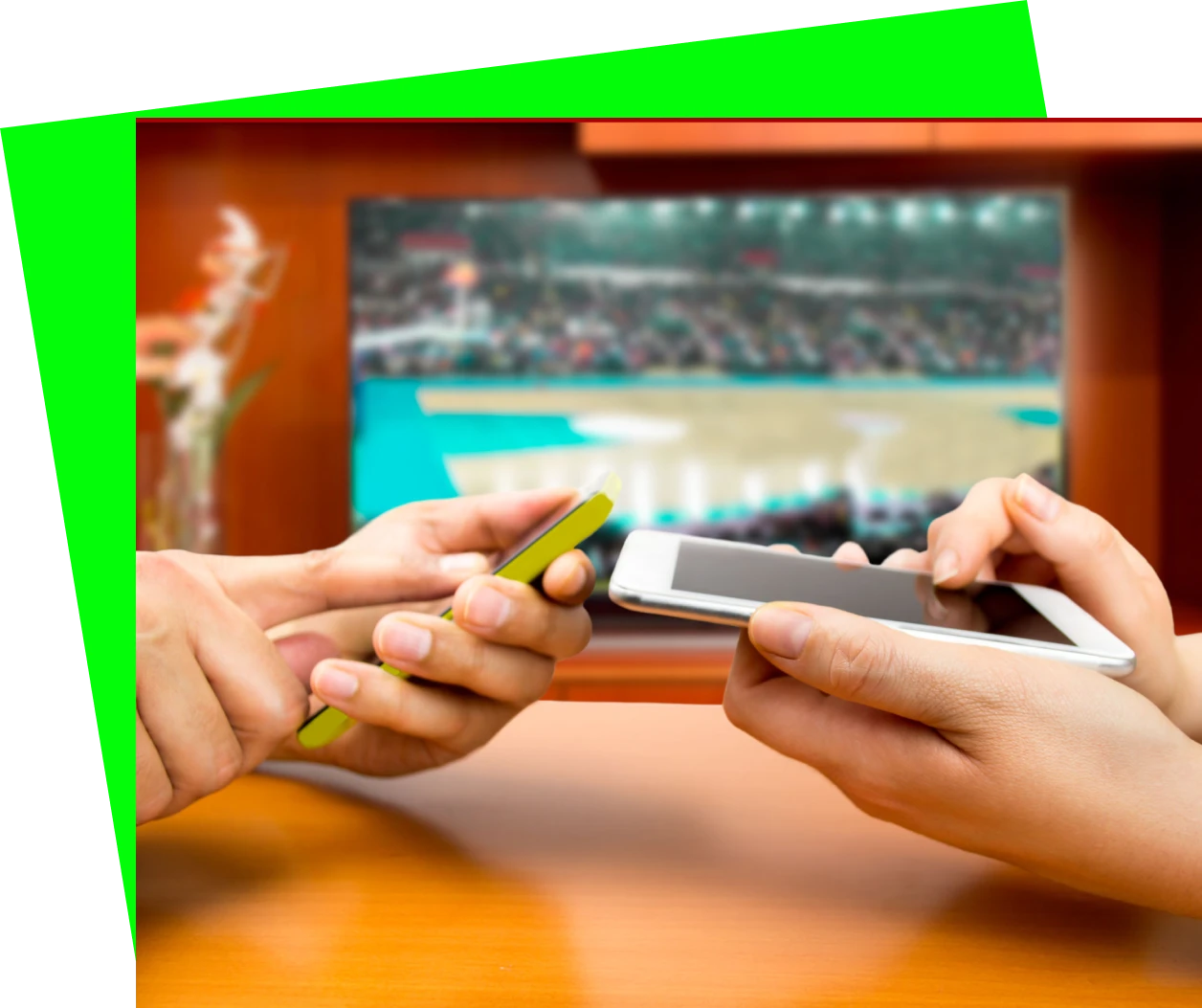 Two people using phones during sports match